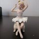 Статуэтка из фарфора Маленькая балерина на пуфике