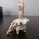 Статуэтка из фарфора Маленькая балерина на пуфике
