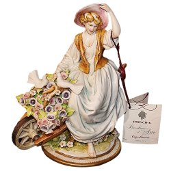 Статуэтка из фарфора Дама на тележке с цветами