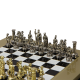 Шахматы Греко-Римский период, черно-белая доска Manopoulos MP-S-3-28-BLA, фотография серебряных фигур на доске