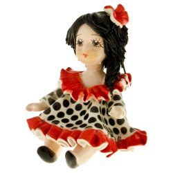 Статуэтка из фарфора Девочка с красным бантом