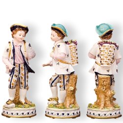 Статуэтка из фарфора Мальчик с корзиной в белой курточке