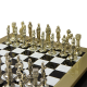 Шахматы Ренессанс, Черно-белая доска Manopoulos MP-S-9-36-BLA, фотография золотых фигур на шахматной доске