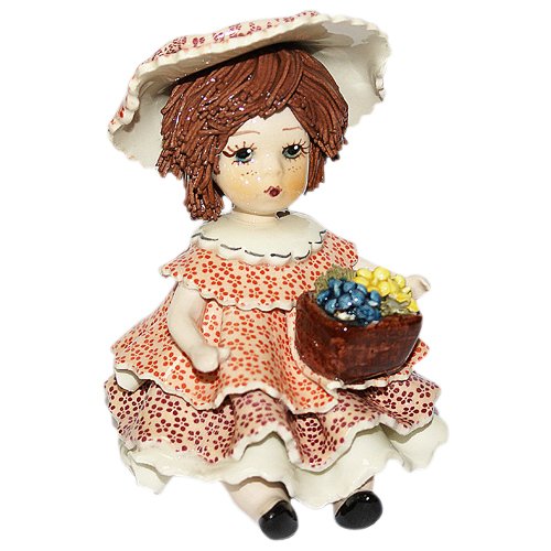 Фарфоровая статуэтка Девочка сидящая с темными волосами в розовом платье с цветами