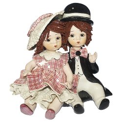 Статуэтка из фарфора Девочка в розовом платье и мальчик