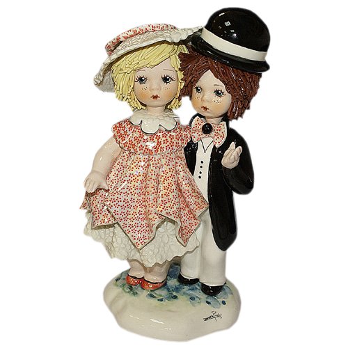 Статуэтка из фарфора Девочка и мальчик стоящие
