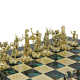 Шахматы Троянская война, Зеленая доска, фигуры антик Manopoulos MP-S-4-A-36-G, фотография золотых фигур на доске