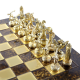 Шахматы на коричневой доске Олимпийские Игры Manopoulos MP-S-7-36-BRO, золотые фигуры