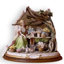 Статуэтка из фарфора Цветочница с котятами