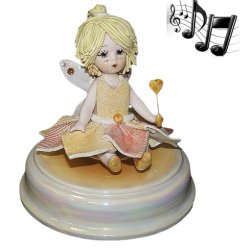 Статуэтка из фарфора музыкальная Маленькая фея желтая