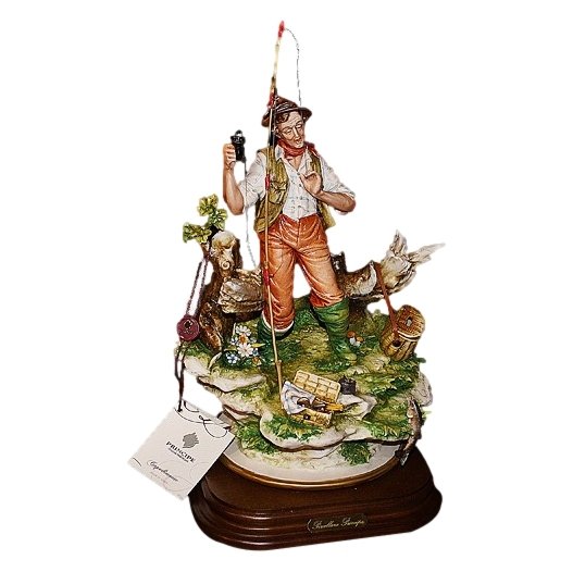 Статуэтка из фарфора Рыбак