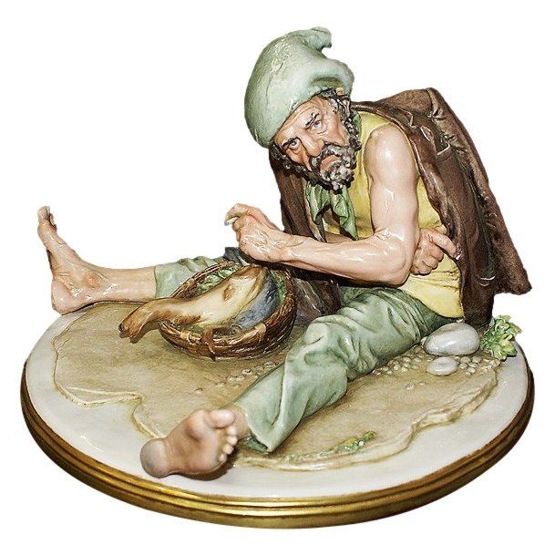 Статуэтка из фарфора Рыбак